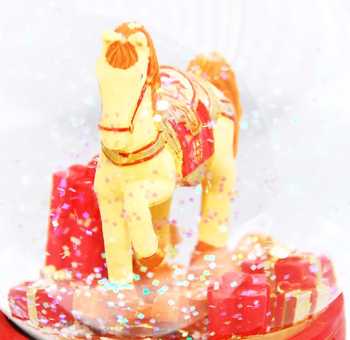 Schneekugel Schaukelpferd rot mittel - Schneekugelhaus