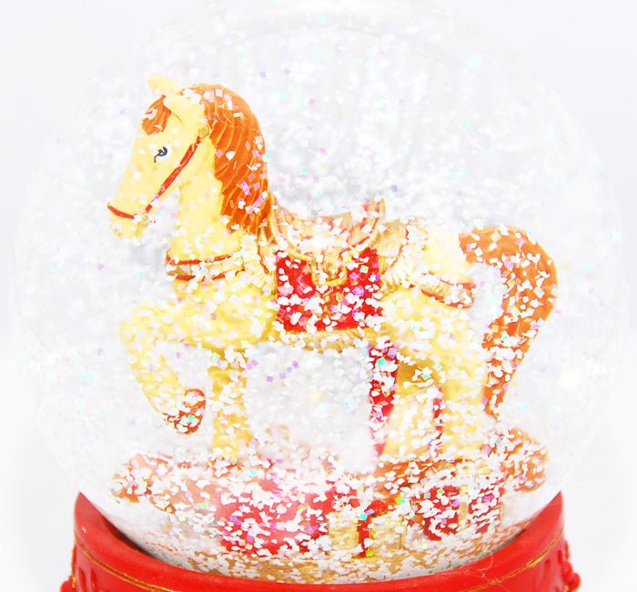 Schneekugel Schaukelpferd rot mittel - Schneekugelhaus